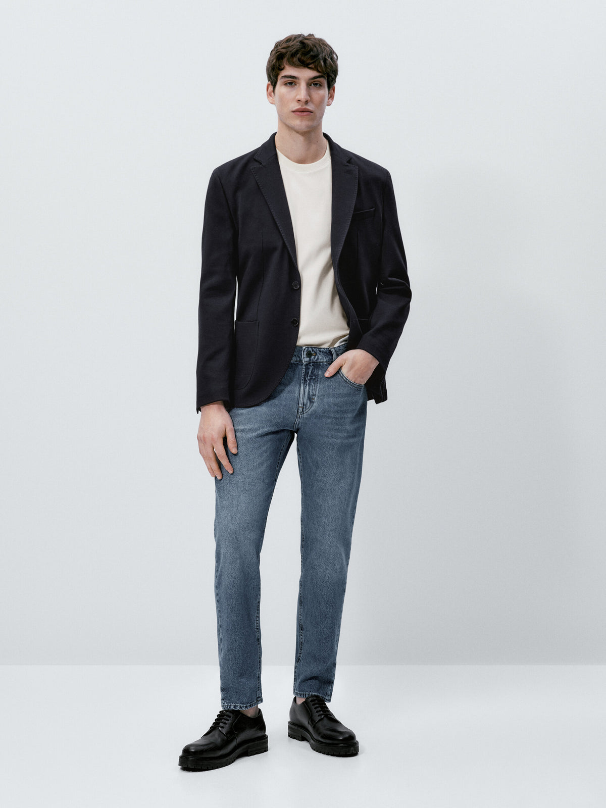 Pantalón vaquero mid stone wash tapered fit - INDIGO