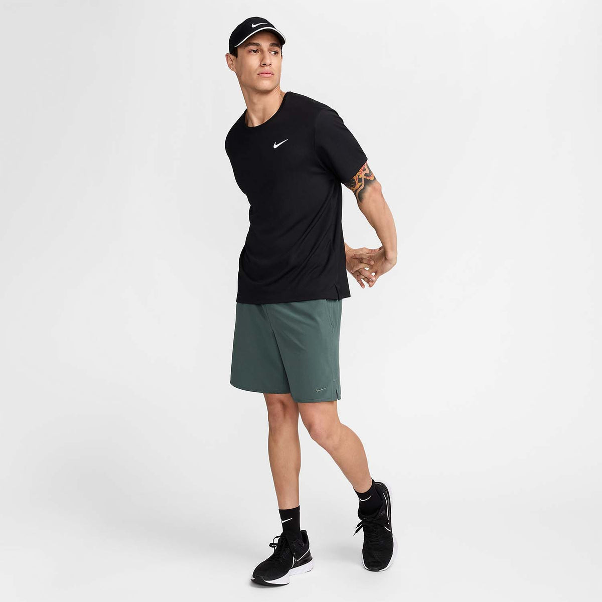 Nike Dri-FIT Unlimited 7in Pantaloncini Vintage Green/Black