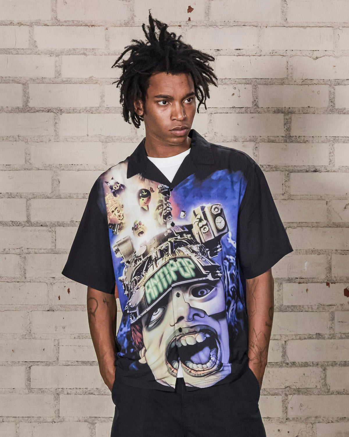 ANTI-POP BUTTON UP