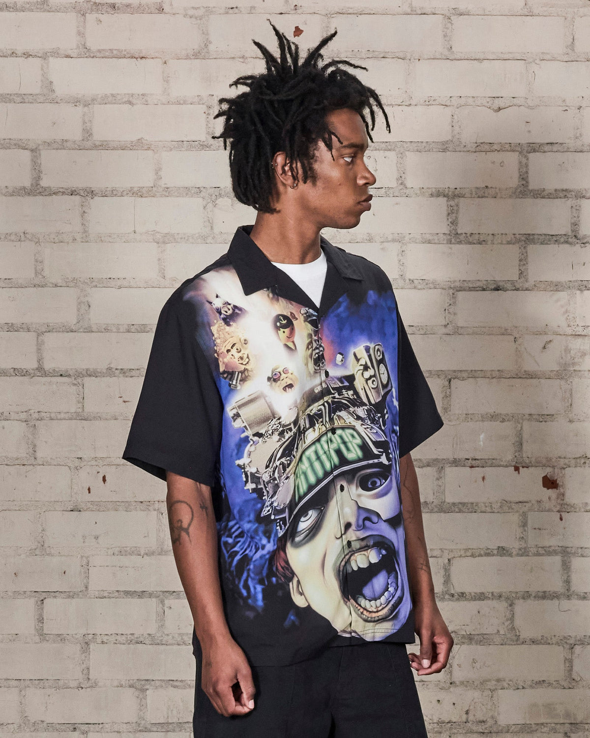 ANTI-POP BUTTON UP